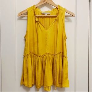 Gold sleeveless blouse